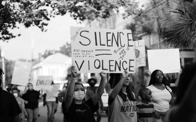 Protestors during a march earlier this month in Fernandina Beach. KATHRYN BYNUM/SPECIAL