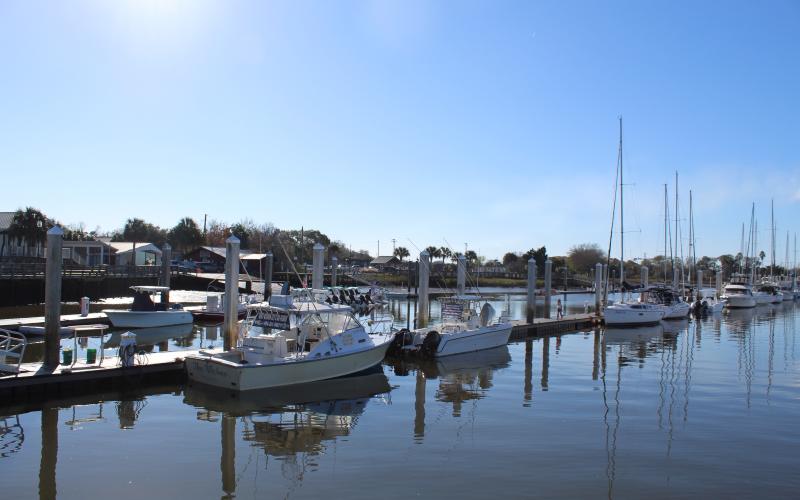 The new company charged with managing the Fernandina Harbor Marina has reversed course on increased prices for slips.