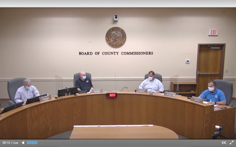 Four members of the Nassau County Board of County Commissioners wear masks Wednesday for their special meeting. Commissioner Aaron Bell attended via videoconferencing. NASSAU COUNTY