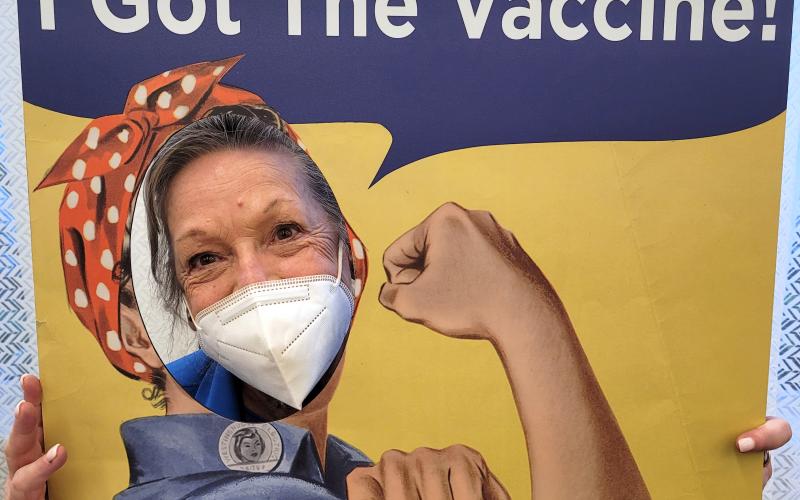 Marilyn Bailey celebrates receiving the COVID-19 vaccine at The Lakeside at Amelia Island.