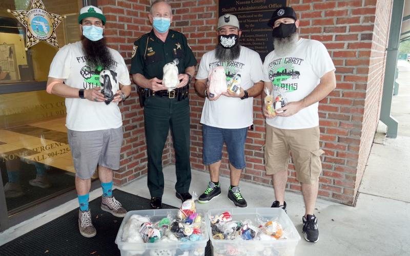 The Bearded Villains Volunteer Group delivers a little over 100 beanie babies, sanitized and prepackaged, to the Nassau County Sheriff’s Office for deputies to distribute to children in the community. These were donated by Katherine Hargesheimer and her family.