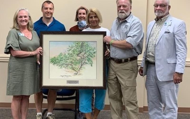 Keep Nassau Beautiful was recently honored by the Florida Urban Forestry Council’s Friends of Our Urban Forest Awards. From left are Keep Nassau Beautiful Executive Director Lynda Bell, Keep Nassau Beautiful Chadd Scott, Kelley McCarter and Margo Story, Florida Urban Forest Council President and Keep Nassau Beautiful member Mike Cole.