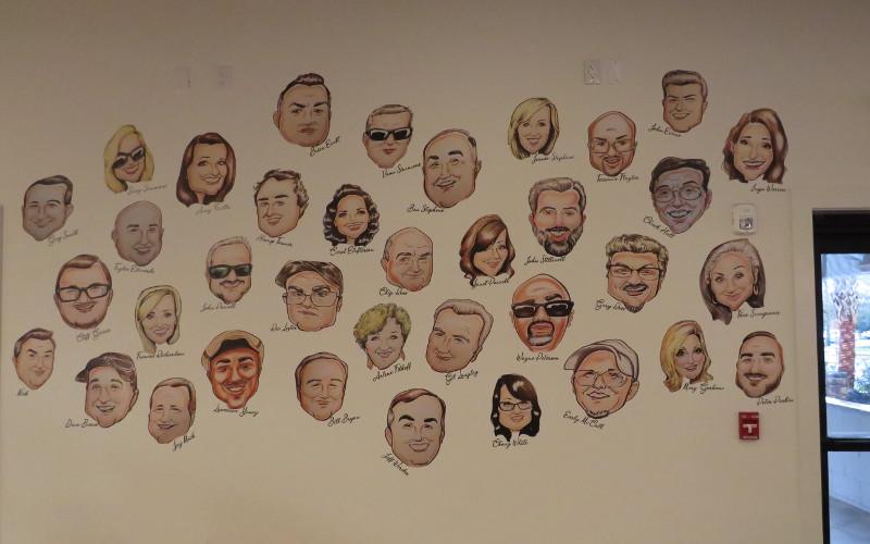 Caricatures of well-known local residents painted by Daisy Fensik adorn the walls of the Boat House, an homage to the restaurant’s Fernandina Beach roots. JULIA ROBERTS/NEWS-LEADER