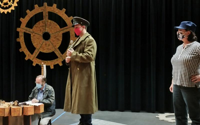 Ron Price, Nicholas Marquardt, and Wendy Gilvey rehearse a scene from the upcoming show “Those Who Fall in Love like Anchors Dropped upon the Ocean Floor,” which opens Feb. 12 at Amelia Community Theatre.