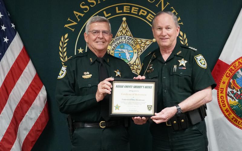 Roy Henderson, left, and Nassau County Sheriff Bill Leeper.