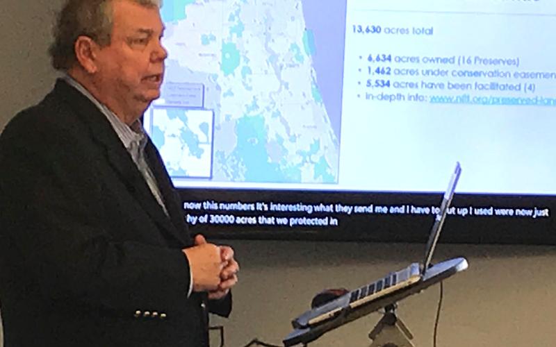 North Florida Land Trust President Jim McCarthy, left, recently spoke at the Men’s Newcomers Club meeting.