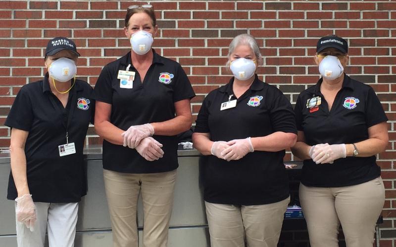 Dr. Lauren Jones, food services director for Nassau County School District, said that teachers, paraprofessionals and administration volunteered to help food service staff deliver meals to students at five drive-thru sites after schools closed in March. The program is feeding students under the summer food service program. NASSAU COUNTY SCHOOL DISTRICT