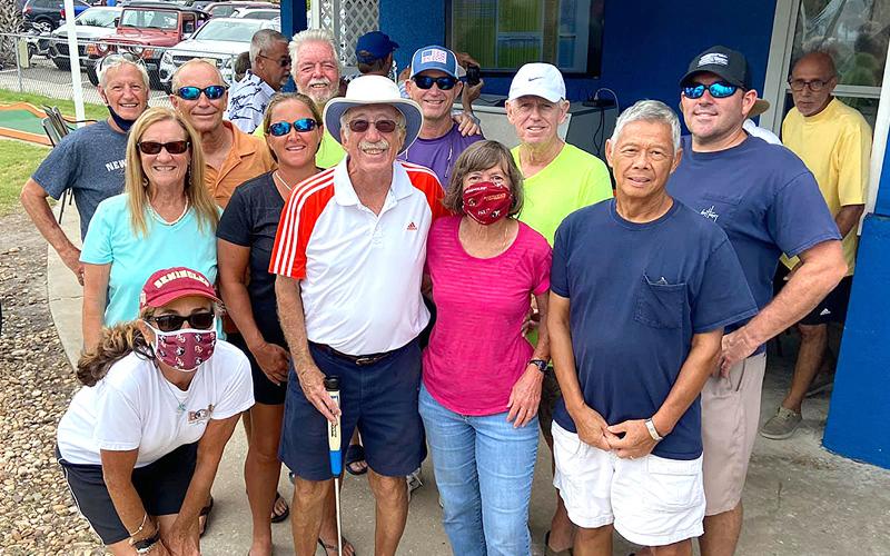 Jim Last had lots of support from his pickleball family during the 61st annual Professional Putters Association Championship week on Amelia Island. Pictured are, front row from left, Cyndi Teitelbaum, Last, Mary Jean Last, Ed Eng; second row, Chmone Ashley, Cyndi Roberts, Art Nichols, Chris Gamble; third row, Kevin O’Connor, Steve Ashley, Dan Broome, Gary Calhoun; and, far back right, PPA Commissioner Joe Aboid. SUBMITTED PHOTO