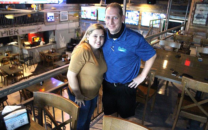 Sabrina and Joey Helms chose to honor their son’s legacy by organizing a charity golf tournament to benefit the Collin Helms Memorial Scholarship Fund, which will award scholarship money to Fernandina Beach High School baseball players. BETH JONES/NEWS-LEADER