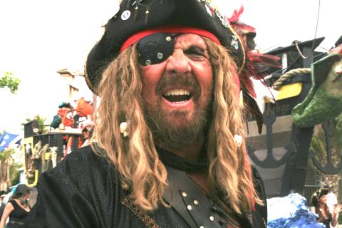 A pirate snarls at the 2019 Pirate parade to kick of Shrimp Festival weekend.  Peg Davis/News-Leader