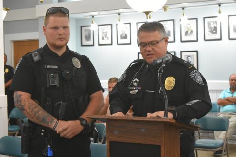 Officer Cameron Wilkinson (left) was recognized for his lifesaving actions. 