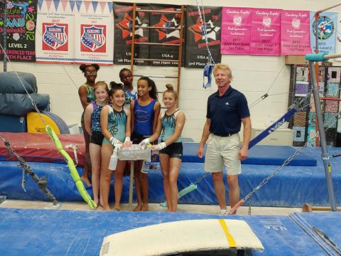 Currently housed in a converted basketball gym, the gymnastics program is anticipating the construction of a new facility dedicated to gymnastics and cheer classes and team formation. 
