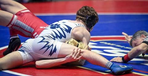 Camden County's Riley Dahlgren pinned Lowndes' Ethan McCullough for the Class 7A 120-pound title. (Submitted photo by Amber Cloy Photography)