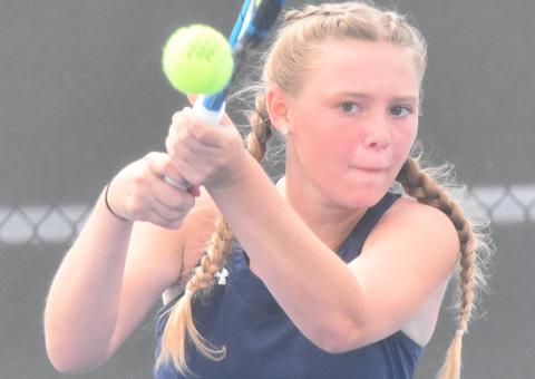 Ashlie Aldridge smacks a backhand in Camden County’s first-round playoff. (Andy Diffenderfer/Tribune & Georgian)
