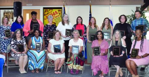 Seated, from left, are Vonice Harrelson, Konya Watkins, Suzanna Whitetree, Karyn Chester, Shantra Hall, Debbie Tennyson, Kayla Burnett; back row, Katherine Dixon, Demaris Cullen, Temika LaFavor-Dallas, Nancy Bowyer, Angela Walker, Danielle Pocernik, Samantha Dixon, Chelsey Dimsdale, Tara Port and Jared Curtis.