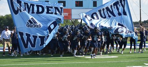 The Wildcats take the field for their Monday scrimmage with Munroe Day. (Andy Diffenderfer, Tribune & Georgian)