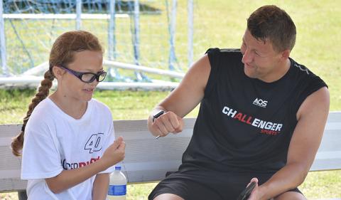 Coach Matt Mountford chats with Rubiana Rivers. (Andy Diffenderfer/Tribune & Georgian)