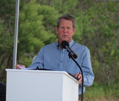 Gov. Brian Kemp speaks during a groundbreaking ceremony for Cumberland Inlet on Friday.