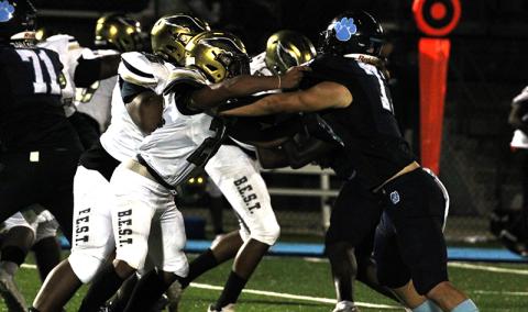 Wildcat defender Dylan Higginbotham draws the attention of B.E.S.T. blockers. (Andy Diffenderfer, Tribune & Georgian) 