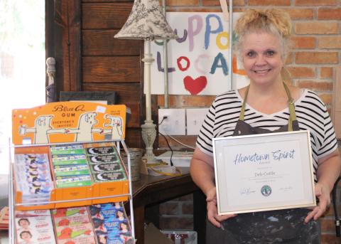 Cottle & Gunn owner Deborah Cottle recently received the city of St. Marys’ Hometown Spirit Award for her commitment to city causes.