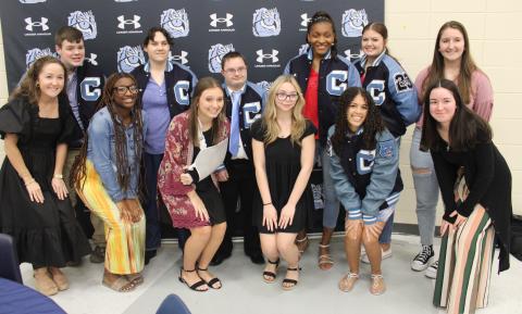 Letter jacket recipients Adam Brewer, Valerie Thompson, Veyonce Covington and Tyson Brodak are with “buddies” Clary Minnick, Zyla Ronan, Riley Copeland, Chloe Moon, Abrianna Antley, Hannah Cassel, Raina Croxton and Natalie Brewer.