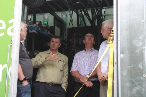 Visitors to the Hydrogen Energy Road Show on Friday tour an 18-wheel truck that is powered completely by hydrogen energy.
