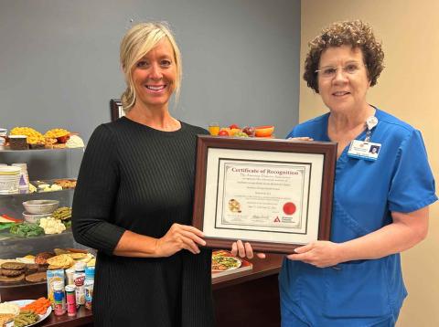 Southeast Georgia Health System’s diabetes educator, Allison Hendry, left, and Diabetes Education program coordinator Sue Ullrich show off an award the hospital recently earned.