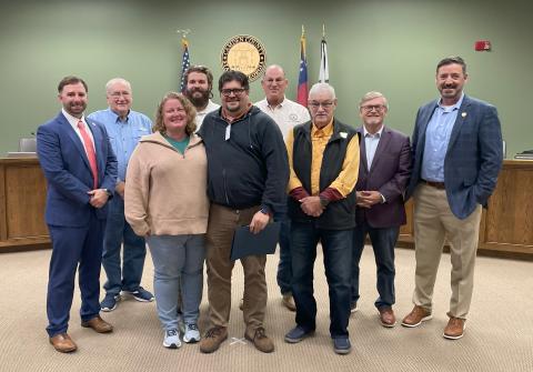 The Camden County Board of Commissioners recently honored Scott Van Osdol as its Employee of the Quarter. From left are County Administrator Shawn Boatright, Commissioner Lannie Brant, Leigh Van Osdol, Commissioner Trevor Readdick, Scott Van Osdol, Chairman Ben Casey, Commissioners Jim Goodman and Martin Turner, and Senior Director of Human Resources and Risk Management Mike Spiers.