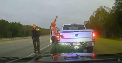 Camden County Sheriff’s Office Sgt. Buck Aldridge, left, deploys a Taser at Leonard Allan Cure during a traffic stop Oct. 16. Aldridge later shot and killed Cure when the two fought during the incident.