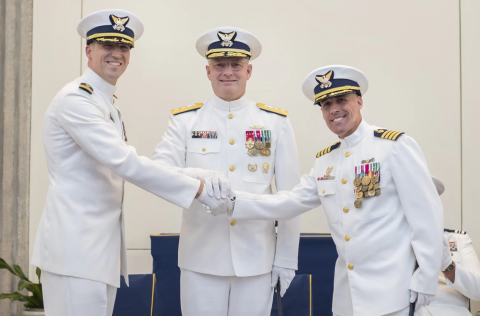 Cmdr. Jeffrey Prebeck assumes command of Coast Guard Maritime Force Protection Unit Kings Bay from Capt. David Vicks during a change of command ceremony July 11 in St. Marys. Rear Adm. Douglas Schofield, commander, Coast Guard Seventh District, presided over the ceremony.