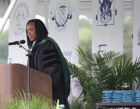 Camden County Schools Superintendent Tracolya Green, a 2001 Camden County High graduate, speaks during the 2024 commencement ceremony at Chris Gilman Stadium.