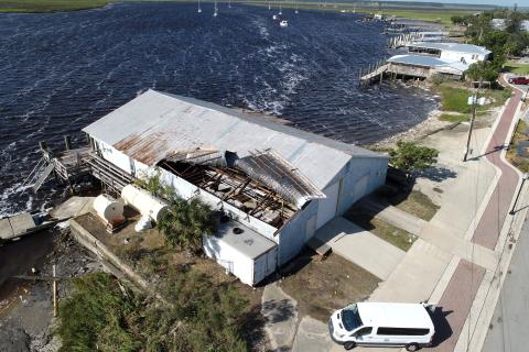 The roof of the building at Lang’s Marina received substantial damage from Hurricane Helene on Friday morning. Thousands of Camden County residents were without power through most of the weekend. (Michael Lewis Aerial Photography | For the Tribune & Georgian)