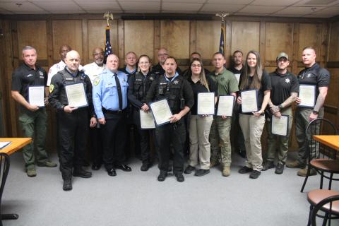 ABOVE: Camden County Sheriff Kevin Chaney recognized Camden County Sheriff’s Office employees and area agencies for their contribution during an active-shooter event Jan. 8. BELOW: Chaney awards deputy Dakota Todd her certificate. To view more photos from the event, visit the Tribune & Georgian’s Facebook page.