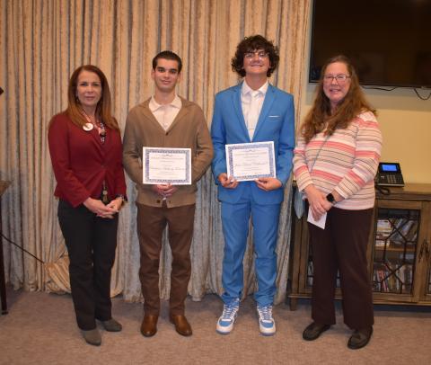 Christian Tortorici and John Clelland IV were recently honored with the Sue Gilvey Memorial Scholarship. From left are Lakes Crossing Senior Care Center Executive Director Patti McNeal, Tortorici, Clelland and LaQuita Herrin, a representative of the Gilvey family.