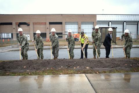 From left, Capt. Chris Bohner, commanding officer, Naval Submarine Base Kings Bay; Capt. Mark Parrella, program manager, Columbia Class SSBN Program (PMS 397); Capt. Miguel Dieguez, commanding officer, Naval Facilities Engineering Systems Command (NAVFAC) Southeast; Rear Adm. Robert E. Wirth, commander, Submarine Group TEN; George Rogers, CEO, RQ Construction; Capt. Michael Paisant, commanding officer, Trident Refit Facility, Kings Bay; Lee Hopson, vice president of federal programs for AECOM; and Capt. Jua