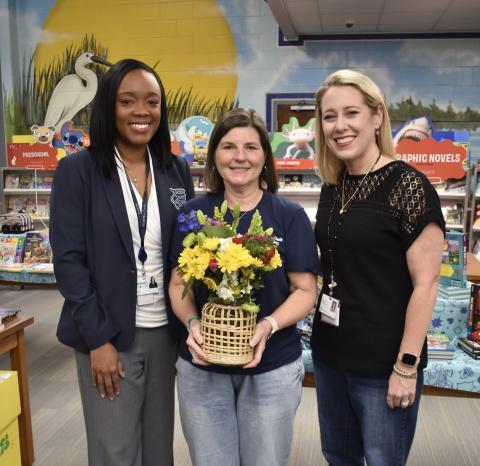 Camden County Schools Superintendent Tracolya Green, left, and Mary Lee Clark Elementary School Principal Rika Dow, right, honor the school district’s Media Specialist of the Year, Ardith Sweatt.
