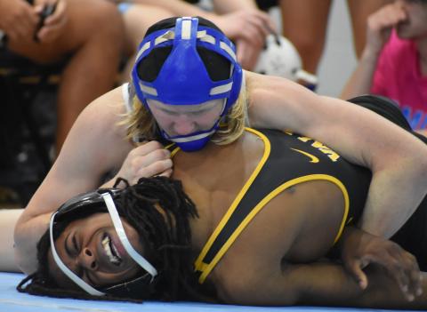 Camden County High School’s Hunter Prosen, top, wrestles against Valdosta’s Elijah Barnes during the Region 1-6A dual tournament in Kingsland.