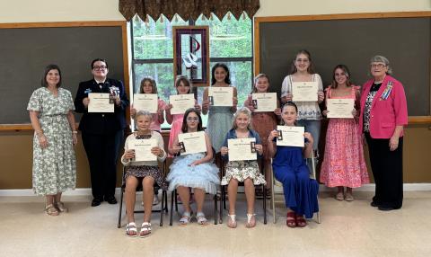 Winners of the Daughters of the American Revolution’s awards were, front row, from left, Mary Lee Clark Elementary’s Libby Bubp, Sugarmill Elementary’s Silje Sherven, Crooked River Elementary’s Charlotte Cimaglia and Matilda Harris Elementary’s Evangeline Everett. Back row: Earl of Camden’s Ardith Sweatt, Camden County High School JROTC’s Brooke Salazar, David L. Rainer Elementary’s Kinley Wilson, Woodbine Elementary’s Charlotte Horn, St. Marys Middle School’s Windsor Lane Weaver, Mamie Lou Gross Elementary