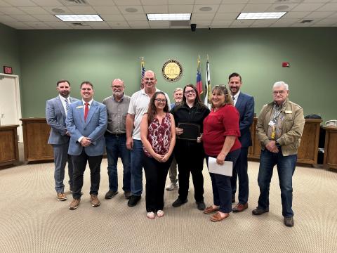 The Camden County Board of Commissioners Information Technology Department’s Kayla Oliver was recently honored as the entity’s Employee of the Quarter. From left are County Administrator Shawn Boatright, Commissioners Cody Smith and Robbie Cheek, Chairman Ben Casey, Employee Recognition Member Krystin Miller, Commissioner Martin Turner, Employee Recognition Committee Member Amy Peeples, Deputy County Administrator Seth Collins and Commissioner Jim Goodman.