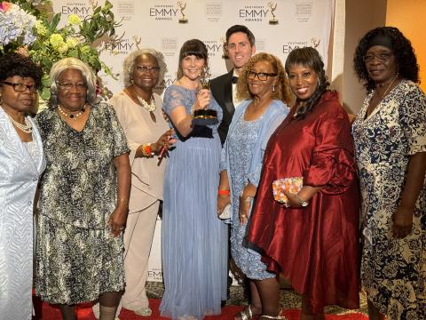 “The Day That Shook Georgia,” a documentary about the Thiokol Plant explosion in 1971, recently won a Southeast Emmy. From left are Thiokol Memorial Project’s Beatrice Hall, Emma Lou Gibbs, Angela Myers, executive producer Anne Longstreth, director Patrick Longstreth, and Thiokol Memorial Project’s Hattie Fogle, Melissa Jackson and Henrietta Lee.