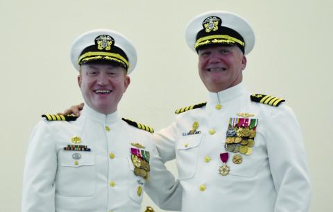 U.S. Navy Capt. Bill Dull, left, replaces Capt. Chris Bohner as commanding officer at Kings Bay Naval Submarine Base.