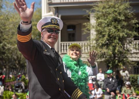 U.S. Navy Capt. Chris Bohner, the commanding officer at Kings Bay Naval Submarine Base, waves to the crowd during the Savannah St. Patrick’s Day Parade.