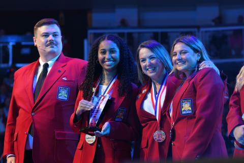 Camden County High School’s Rhiyana Revels, second from left, and Chloe Loper, far right, earned first place in the Models of Excellence-Technical Skills category during the SkillsUSA National Leadership Conference in June in Atlanta. With the two students are teacher Jennie Corse, second from right.