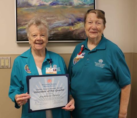 Southeast Georgia Health System Camden Campus Volunteer Services President Kathleen Worthing, right, honors Spring Volunteer of the Quarter Jewellene Braun.