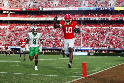 Georgia freshman Elyiss Williams races into the end zone for 23-yard touchdown reception against Marshall on Saturday. Williams, a 2025 Camden County High School graduate, was playing in his first collegiate game. The Bulldogs won 45-7. (Photo by the University of Georgia)
