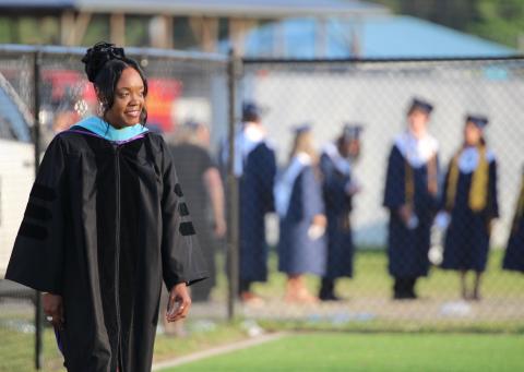 Camden County Schools Superintendent Tracolya Green prepares to walk onto the stage in May prior to the Camden County High School graduation ceremony.
