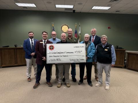 Camden County Sheriff Kevin Chaney, center, and the Camden County Board of Commissioners recently received a $9,400 grant from the Firehouse Subs Public Safety Foundation for eight Philips Onsite AEDs.