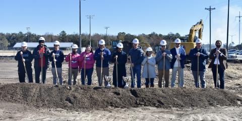 Camden County Schools leaders and other officials break ground on the Camden County High School Ninth Grade Center extension.