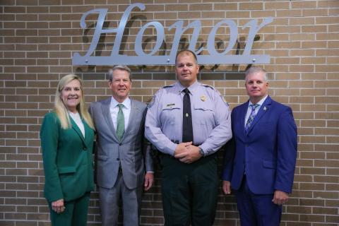 Camden County resident Col. Chris Hodge, second from right, was appointed the Georgia Department of Natural Resources Director of Law Enforcement. From left are Georgia First Lady Marty Kemp, Gov. Brian Kemp, Hodge and DNR Commissioner Walter Rabon.