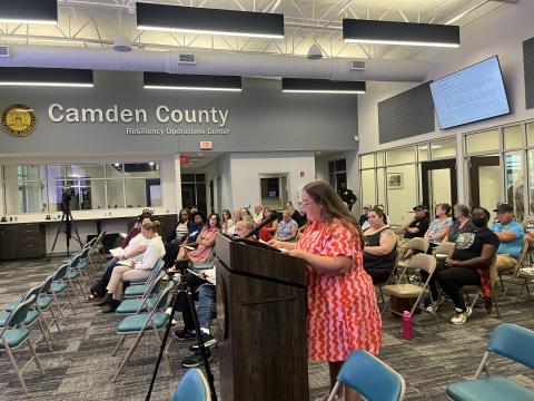 One Hundred Miles’ South Coast Advocate Kat Montgomery speaks Monday night in favor of a moratorium on data centers in Kingsland.